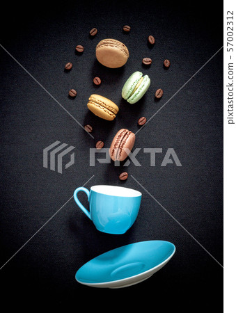 Appetizing colored macarons in funny style 57002312