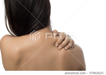 Woman with shoulder pain isolated on white background 57002625