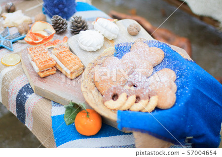 Blue winter decor sweet cookies on the table. Blue winter decor sweet cookies on the table. 57004654