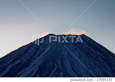 Mt. Fuji before snow rising from Lake Ryugatake Mt. Fuji before snow rising from Lake Ryugatake 57005330