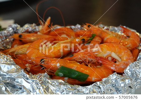 Pile of red unpeeled shrimps.Seafood dish. 57005676