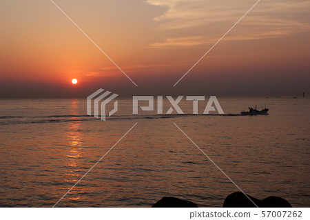 Sea sunrise and ship 57007262