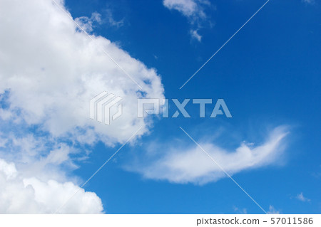Beautiful white clouds with blue sky background Beautiful white clouds with blue sky background 57011586