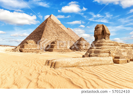 View on the Great Sphinx and the Pyramids in Giza 57012410