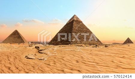 Famous Giza Pyramids in the sand desert, Egypt Famous Giza Pyramids in the sand desert, Egypt 57012414