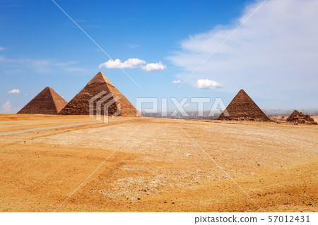 Sunny day in Giza desert, view on the Pyramids 57012431