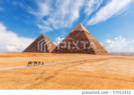 The Giza Pyramids in the desert, sunny day scenery 57012432