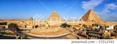 Giza Pyramids and living buildings in front of Giza Pyramids and living buildings in front of 57012583