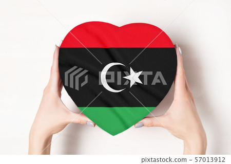 Flag of Libya on a heart shaped box in a female Flag of Libya on a heart shaped box in a female 57013912