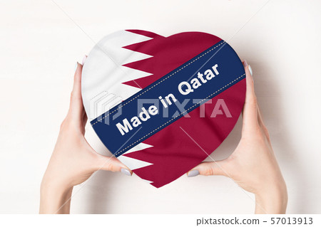 Inscription Made in Qatar the flag of Qatar. 57013913