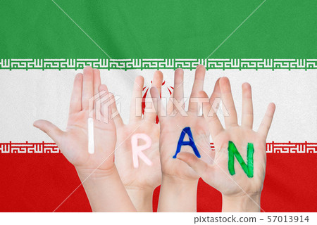 Inscription Iran on the children's hands against 57013914