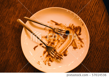 Dirty plate after eaten piece of cake Dirty plate after eaten piece of cake 57014536