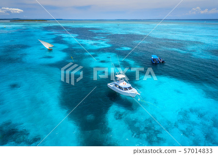 Aerial view of the yachts, fishing boats in the sea Aerial view of the yachts, fishing boats in the sea 57014833