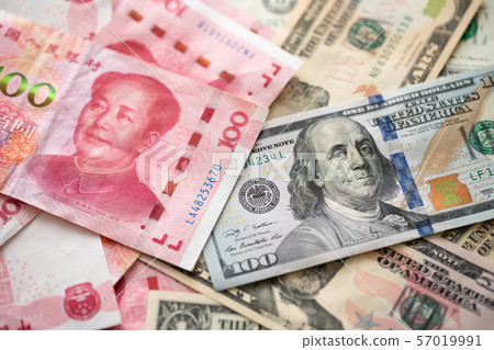 Dollar and Yuan imaged as a trade war Dollar and Yuan imaged as a trade war 57019991