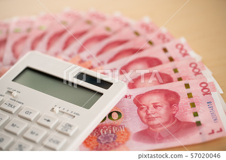 Money and calculator with the image of household finance 57020046