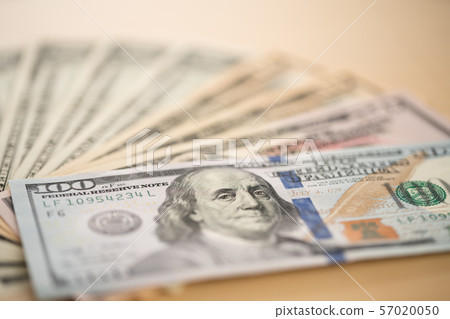 American dollar bills placed on a desk 57020050