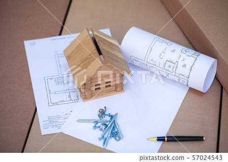 Build new house. House on blueprints - housing project 57024543