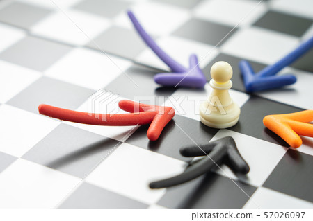 chessboard with a chess piece on the back chessboard with a chess piece on the back 57026097