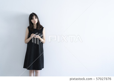 Woman using a smartphone 57027876