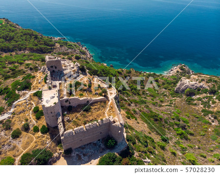 Image of ancient fortress, sea, mountain fortress on summer day Image of ancient fortress, sea, mountain fortress on summer day 57028230