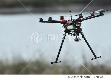 Industrial drone in flight Industrial drone in flight 57030190