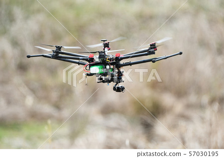 Industrial drone in flight Industrial drone in flight 57030195