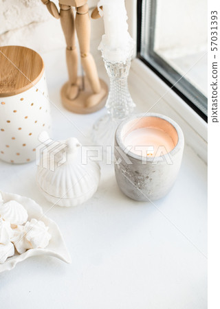 White real home decor, ceramic interior details with vases and candles 57031393