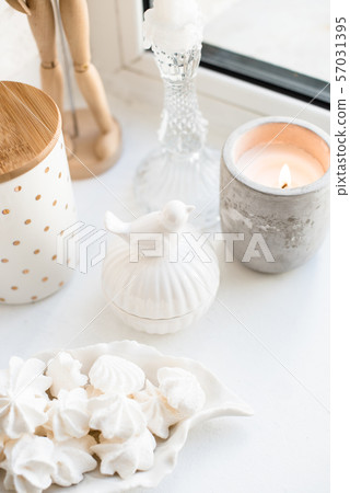White real home decor, ceramic interior details with vases and candles White real home decor, ceramic interior details with vases and candles 57031395
