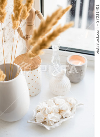 White real home decor, ceramic interior details with vases and candles White real home decor, ceramic interior details with vases and candles 57031401