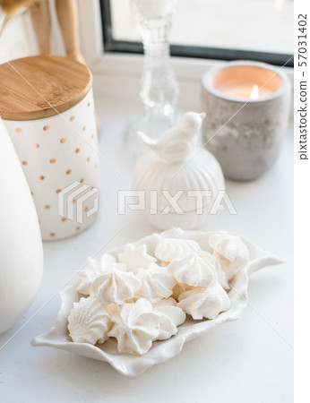 White real home decor, ceramic interior details with vases and candles White real home decor, ceramic interior details with vases and candles 57031402
