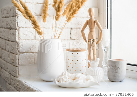 White real home decor, ceramic interior details with vases and candles White real home decor, ceramic interior details with vases and candles 57031406