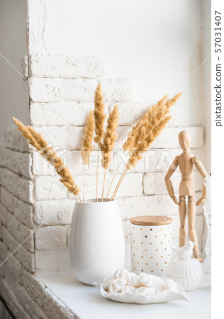 White real home decor, ceramic interior details with vases and candles White real home decor, ceramic interior details with vases and candles 57031407