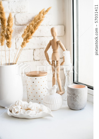 White real home decor, ceramic interior details with vases and candles White real home decor, ceramic interior details with vases and candles 57031411