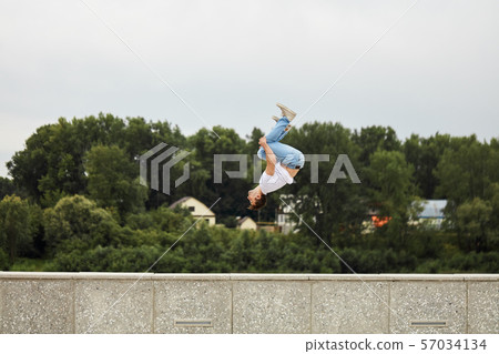 flexible athlete training in the street 57034134