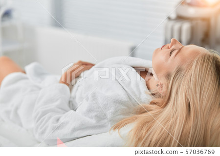 good looking blonde girl having a rest in the beauty shop good looking blonde girl having a rest in the beauty shop 57036769