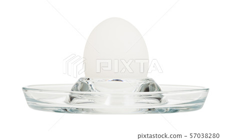 side view of boiled egg in glass egg cup isolated side view of boiled egg in glass egg cup isolated 57038280