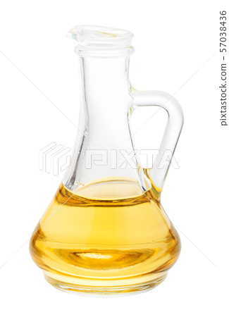 glass jug with vegetable oil isolated on white glass jug with vegetable oil isolated on white 57038436