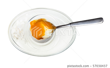 top view of eating of soft-boiled egg with spoon top view of eating of soft-boiled egg with spoon 57038437