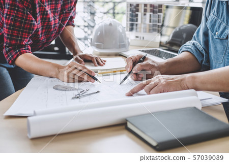 Hands of architect or engineer working on Hands of architect or engineer working on 57039089