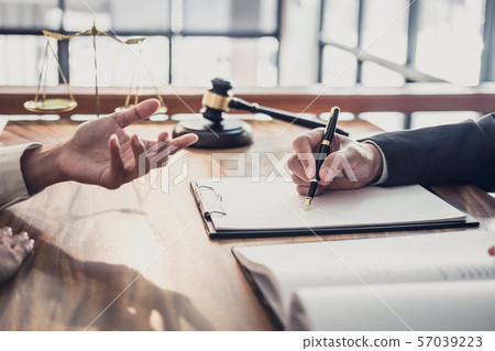 Male lawyer or judge consult having team meeting Male lawyer or judge consult having team meeting 57039223