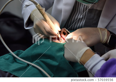 Dental care check up, Dentist examining. 57039556