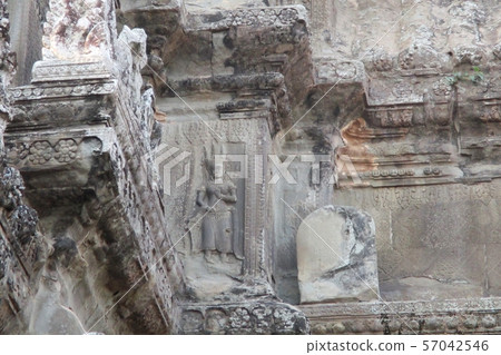 Cambodia Angkor in bas-relief on the wall of Angkor wat Cambodia Angkor in bas-relief on the wall of Angkor wat 57042546