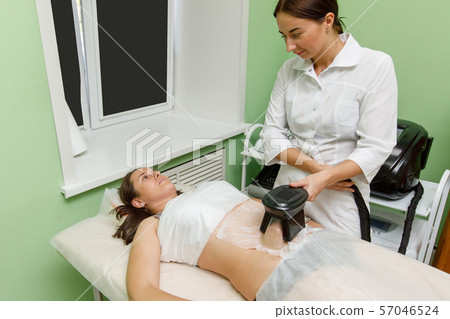 Cryolipolysis fat freezing treatment. Weight loss 57046524