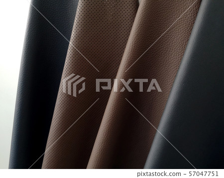 Luxury multicolored leather samples close-up. leatherette fabric texture. Industry background. 57047751