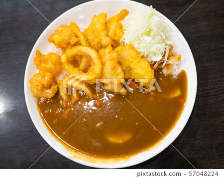 curry rice with deep fried seafood curry rice with deep fried seafood 57048224
