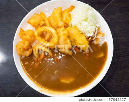 curry rice with deep fried seafood curry rice with deep fried seafood 57048227