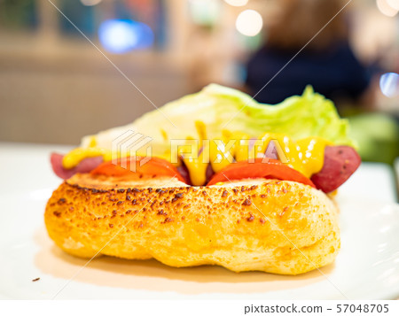 Classic american hot dog sandwich with pork or beef sausage 57048705