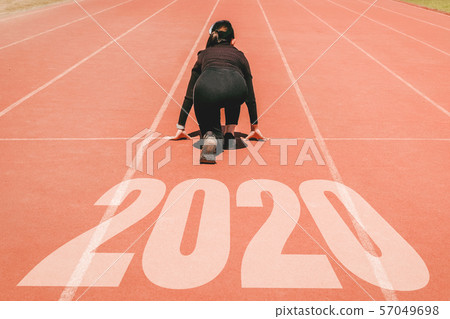 2020 Newyear , Athlete Woman starting on line for 2020 Newyear , Athlete Woman starting on line for 57049698