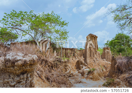 Beautiful Scenery of Water flows through the ground have erosion and collapse of the soil  into a  natural layer at Pong Yub,  Ratchaburi,Thailand Beautiful Scenery of Water flows through the ground have erosion and collapse of the soil  into a  natural layer at Pong Yub,  Ratchaburi,Thailand 57051726