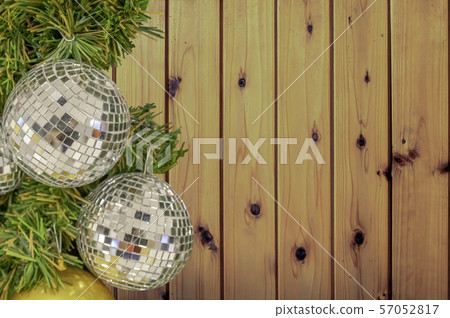 Glass ball ornaments on a Christmas tree Background Plywood Floor With Wood Pattern. 57052817
